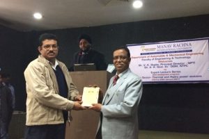 Dr. Devendra Vashist felicitating Mr. V.K.Gupta